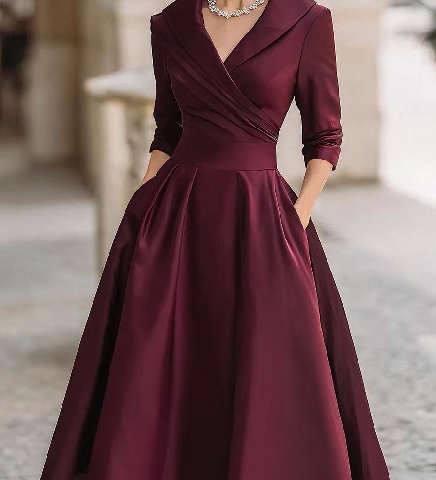 Dharmay | Elegancka sukienka midi